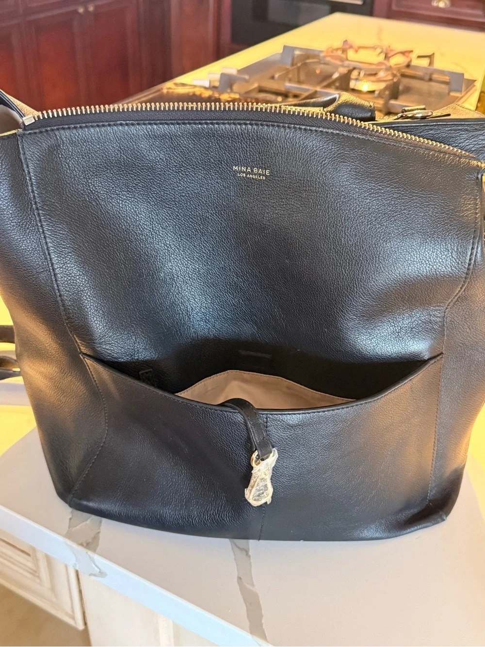 Mina Baie Harper Leather Backpack in Black with Gold Zip